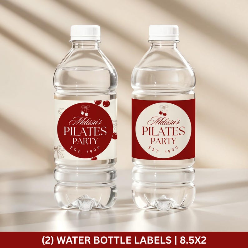 May include: Two clear plastic water bottles with white caps. Each bottle has a label with the text "Melissa's Pilates Party EST. 1999" in a burgundy circle. The bottom of the image reads "(2) WATER BOTTLE LABELS | 8.5X2".