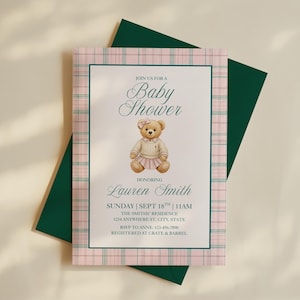 May include: Baby shower invitation featuring a teddy bear wearing a sweater and skirt. The invitation has a pink and green plaid border and includes the text "Join us for a Baby Shower" and details for Lauren Smith's baby shower.