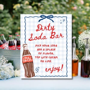 May include: A sign for a "Dirty Soda Bar" with a blue gingham background and red text. The sign includes instructions and a drawing of a soda bottle. Bottles of soda and flavorings are visible.