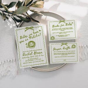 May include: A set of baby shower invitations and inserts with a matcha theme. The main invitation reads "Baby, we love you so Matcha!" in green text. Additional cards include "Books for Baby" and "Diaper Raffle."