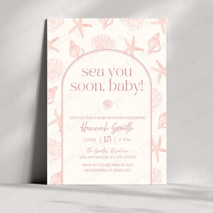 May include: A baby shower invitation with a seashell theme. The invitation features a cream background with pink seashell and starfish illustrations. Text includes "sea you soon, baby!" and event details.