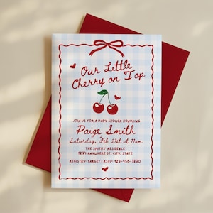 May include: Baby shower invitation with a red border and text. The invitation features the phrase "Our Little Cherry on Top" and includes details for Paige Smith's baby shower. The background is a light blue gingham pattern, with a red envelope.