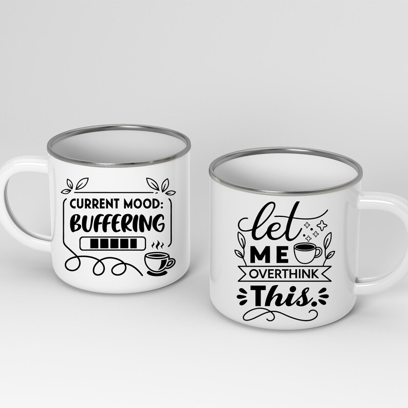May include: Two white enamel mugs with silver rims. One mug reads "CURRENT MOOD: BUFFERING" with a loading bar and coffee cup graphic. The other mug says "let ME OVERTHINK This." with a coffee cup graphic.