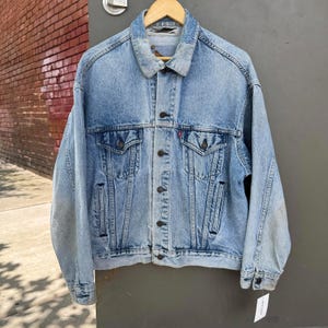 Vintage 90&#39;s Distressed Levi&#39;s Denim Light Wash Jean Jacket Made in USA Medium