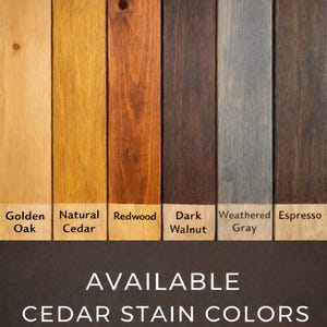 May include: A display of cedar stain colors, including Golden Oak, Natural Cedar, Redwood, Dark Walnut, Weathered Gray, and Espresso. The text "AVAILABLE CEDAR STAIN COLORS" is displayed below the color swatches.