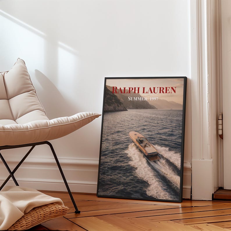 Luxury yacht speeding across the ocean at sunset with coastal mountains in the background, styled as elegant coastal lifestyle wall art.