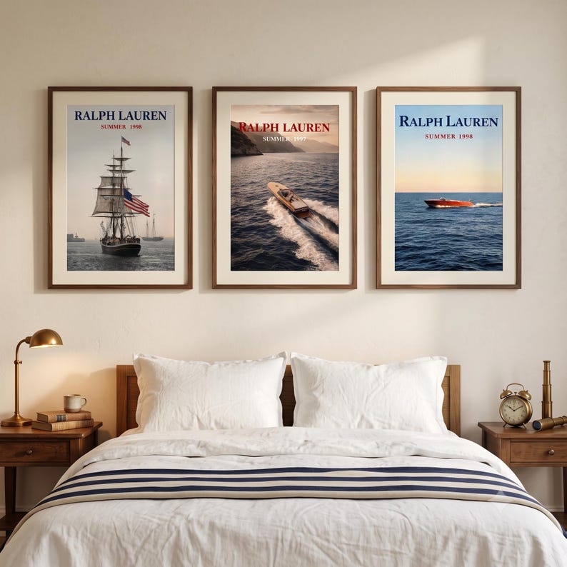 May include: Three framed wall art prints featuring Ralph Lauren Summer 1998 branding. The left print shows a tall ship with an American flag, the center print depicts a wooden motorboat on water, and the right print shows a small boat on the ocean.