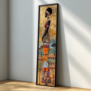 May include: A framed artwork showing a woman in profile, wearing traditional clothing. The artwork uses a mosaic-like design with warm gold, orange, and brown tones. The woman's dress has intricate patterns, and the background suggests an African landscape.