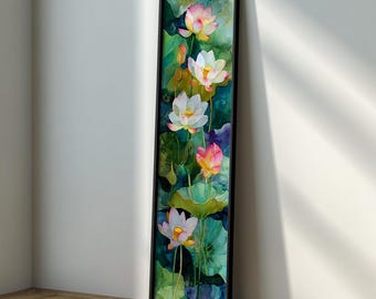 Puede incluir: Pintura en acuarela enmarcada con flores de loto en varias etapas de floración. Las flores son blancas y rosas, sobre un fondo de hojas verdes y un fondo azul oscuro. El marco es negro.