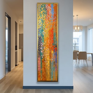 May include: Vertical abstract art piece with a gold frame. The artwork features a vibrant mix of colors, including orange, yellow, blue, and green, with a textured, layered appearance. The design has a floral or botanical theme.