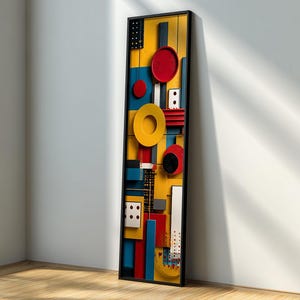 Puede incluir: Arte mural abstracto en un marco negro. La obra presenta una vibrante composición de formas geométricas en amarillo, rojo, azul y blanco. Círculos, cuadrados y rectángulos están dispuestos sobre un fondo amarillo, creando un diseño moderno y llamativo.