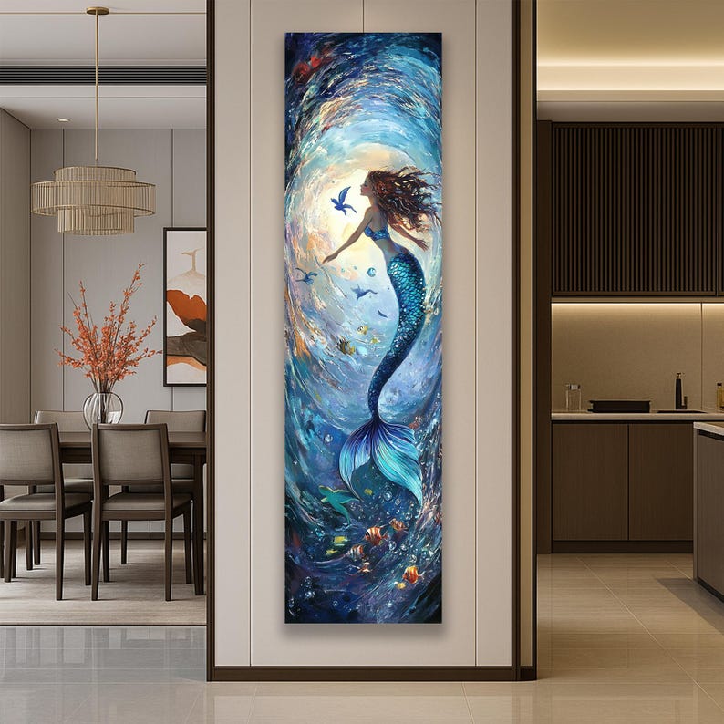 May include: A vertical canvas art piece depicting a mermaid in a swirling underwater scene. The mermaid has flowing auburn hair and a blue tail. The artwork features vibrant blues, greens, and yellows, with fish and birds adding detail.