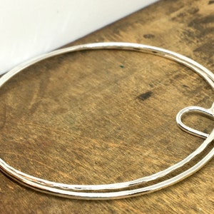 Two Silver Bangles with Heart Charm