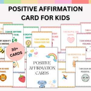 May include: A set of positive affirmation cards for children. The cards display affirmations with colourful illustrations, such as a bee, a lion, a strawberry, and a rainbow. The text "POSITIVE AFFIRMATION CARDS" is clearly visible.