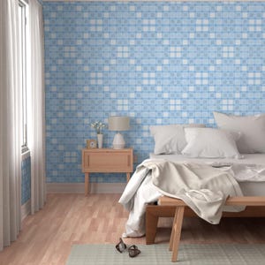 May include: A bedroom with light blue patterned wallpaper, a wooden nightstand, and a bed with white bedding. A window with white curtains is on the left. The room has a light wood floor and a small rug.