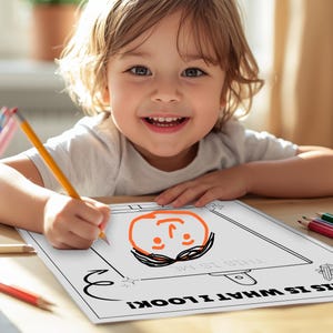May include: A child is drawing a self-portrait on a sheet of paper. The paper has the text "THIS IS WHAT I LOOK LIKE!" and "THIS IS ME". A pencil is in the child's hand. Colouring pencils and a pencil are on the table.