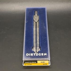 May include: A silver-colored Dietzgen 6" Divider compass in a clear plastic case with a blue interior. The box has the Dietzgen logo and the text "GLOBE G-810". The divider is a drafting tool.