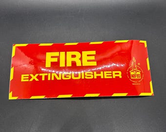 May include: Red and yellow fire extinguisher sign with the text "FIRE EXTINGUISHER" and a small logo with the text "NAFEO".