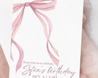 May include: A white invitation card with a watercolor pink bow and flowing ribbons. The text reads "Please join us to celebrate Sofia's birthday" with date, time, and address details. The card is set against a soft pink fabric.