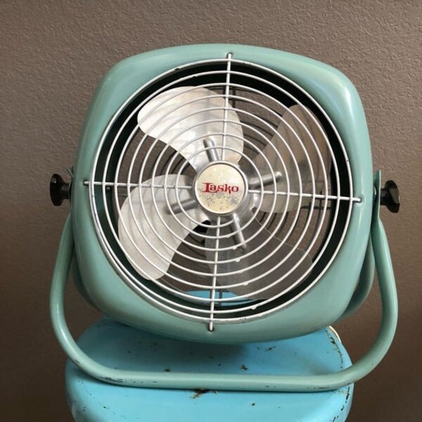 Antique Vintage LASKO electric round industrial floor fan in Robin's Egg Blue.  Works, adjustable, and tilts.  1950s.