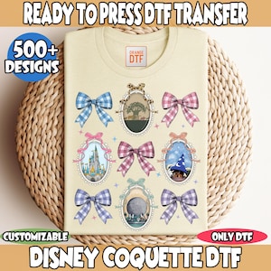 May include: A light beige t-shirt with a design of nine different Disney-themed images, each in a white oval frame with a pearl border. The images include a tree, a castle, a hat, a sphere, and bows. The text "ORANGE DTF" is printed in orange on the shirt. The text "CUSTOMIZABLE" is printed in black on a white background at the bottom left of the image. The text "ONLY DTF" is printed in black on a white background at the bottom right of the image. The text "DISNEY COQUETTE DTF" is printed in black on a white background at the bottom center of the image.