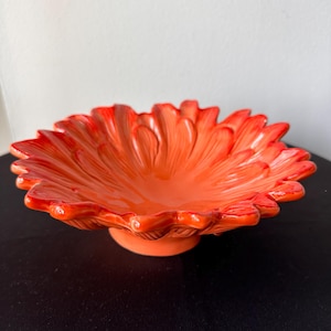 May include: A set of three ceramic mugs with a speckled, matte finish. The mugs are in shades of cream, light gray, and dark gray. Each mug has a simple, minimalist design, perfect for coffee or tea.