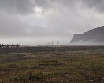 Horseback Riders on Black Sands Beach Iceland
