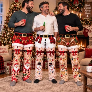 May include: Three pairs of novelty Christmas pants featuring festive designs. One pair is red with Santa, one is white with snowmen, and one is brown with reindeer. Each pair includes a black belt, red bows, and string light patterns.