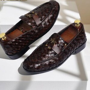 Handmade brown woven leather loafers for men with gold bee ornament, luxury slip-on formal dress shoes.