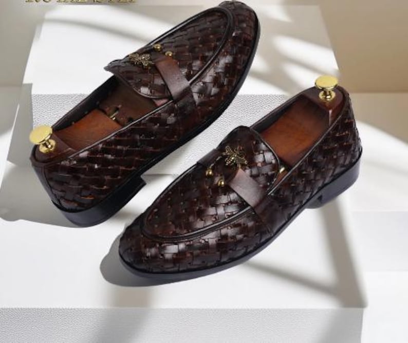 Handmade brown woven leather loafers for men with gold bee ornament, luxury slip-on formal dress shoes.