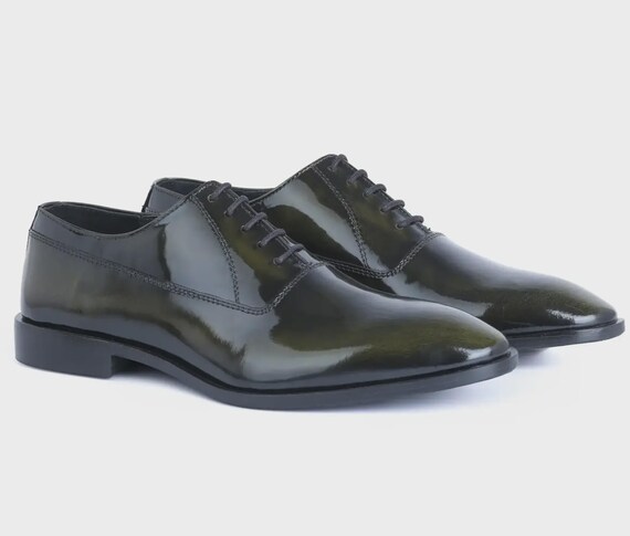 dark green dress black shoes Donna Carolina
