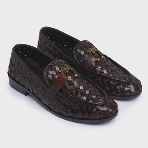 Handmade brown woven leather loafers for men with gold bee ornament, luxury slip-on formal dress shoes.