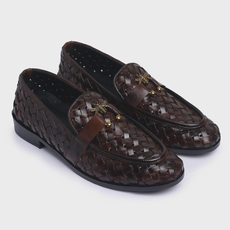 Handmade brown woven leather loafers for men with gold bee ornament, luxury slip-on formal dress shoes.