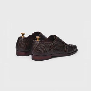 Handmade brown double monk strap shoes for men featuring snake embossed leather texture, cap toe design, dual buckle closure, leather lining and sole, luxury formal footwear ideal for weddings, business attire, office wear, and special occasions.