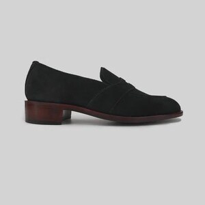 Handmade black suede penny loafers for men featuring a classic slip on silhouette, premium suede leather upper, leather sole, elegant formal design, luxury dress footwear ideal for weddings, business attire, office wear, and special occasions.