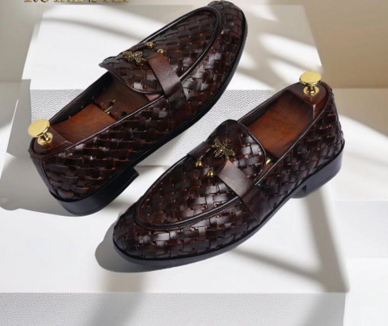 Handmade brown woven leather loafers for men with gold bee ornament, luxury slip-on formal dress shoes.