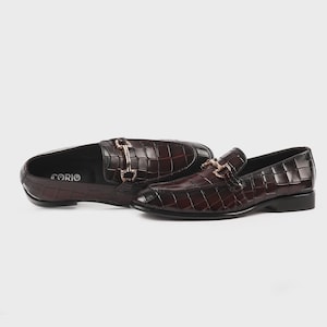 Handmade croc embossed leather horsebit loafers for men featuring a luxurious dark brown finish, polished metal horsebit detail, premium leather construction, slip-on design, and elegant formal styling suitable for weddings, business attire, parties, and special occasions.