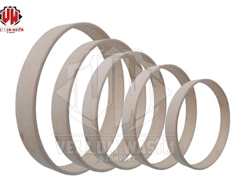 May include: Five wooden hoops of varying sizes, arranged in a staggered pattern. The hoops are all made of light-colored wood and have a smooth, polished finish.