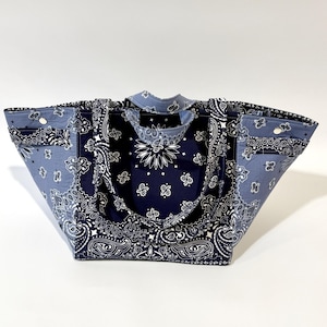 May include: A set of three ceramic mugs with a speckled, matte finish. The mugs are in shades of cream, light gray, and dark gray. Each mug has a simple, minimalist design, perfect for coffee or tea.