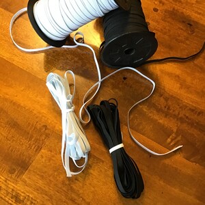 1/4” Elastic  5 yards white & 5 yards Black  10 yards total