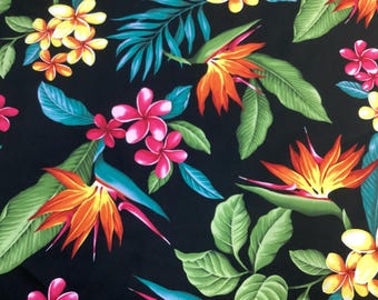 May include: A vibrant floral pattern featuring tropical flowers and foliage on a black background. The design includes orange, yellow, and pink flowers, along with green and teal leaves. This fabric design is suitable for various applications.