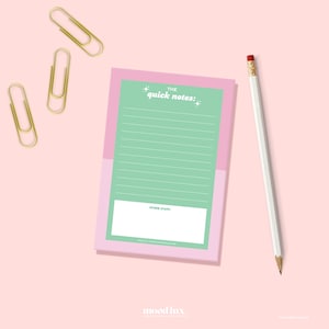 May include: A pink and green notepad with the text "the quick notes:" and "OTHER STUFF:" is shown with a white pencil and three gold paper clips on a pink background. The notepad has lined pages.