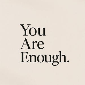 May include: A minimalist print on a cream background features the words "You Are Enough" in a bold, black serif font. The simple design is centered, creating a clean and modern aesthetic.