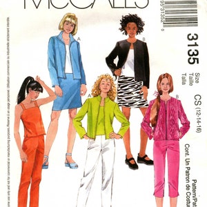 May include: Sewing pattern for a jacket and pants. The pattern includes four different styles: a blue jacket with a skirt, a black jacket with a zebra print skirt, a green jacket with white pants, and a pink jacket with pink pants. The pattern is for sizes 12-14-16.