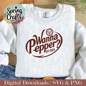 May include: A light gray sweatshirt with the text "Wanna Pepper? EST 2026" in a brown, stylized font, with a volleyball graphic. The sweatshirt has a crew neck and long sleeves. The image also includes the text "Digital Downloads : SVG & PNG".