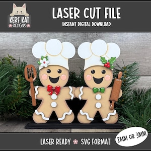 Könnte beinhalten: Eine Laserdatei mit zwei Lebkuchen-Chefköchen. Jede Figur hat eine weiße Kochmütze, rosige Wangen und ein lächelndes Gesicht. Einer hält einen Kochlöffel, der andere eine Teigrolle. Der Text "LASER CUT FILE" und "INSTANT DIGITAL DOWNLOAD" sind zu sehen.