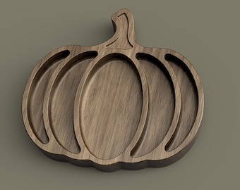 May include: A wooden pumpkin-shaped serving tray with three oval compartments and a stem. The tray is made of a light brown wood with visible grain, perfect for fall gatherings and seasonal decor.