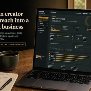 May include: A laptop displaying a dark-themed UGC Creator CRM dashboard with data charts and metrics. Text on the screen reads Turn creator outreach into a real business and UGC Creator CRM - Digital Download, alongside a coffee mug and notebook.