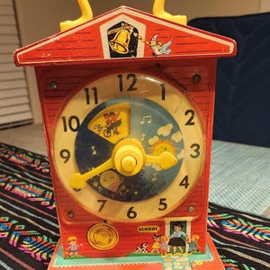 1960s Fisher Price music box teaching clock