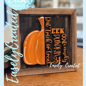 Peut inclure: Panneau d'Halloween encadré en bois avec un dessin de citrouille orange et les mots "EEK PUMPKIN 004 candy Bat Trick or Treat". Le panneau comprend également le texte "Easely Created".